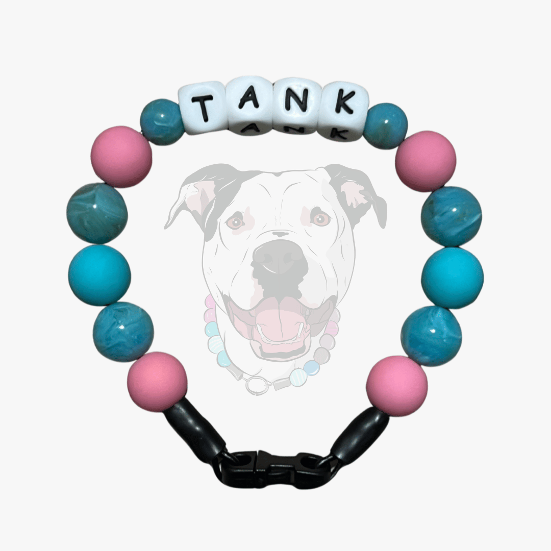 Colorful beaded collar with 'TANK' on a white background