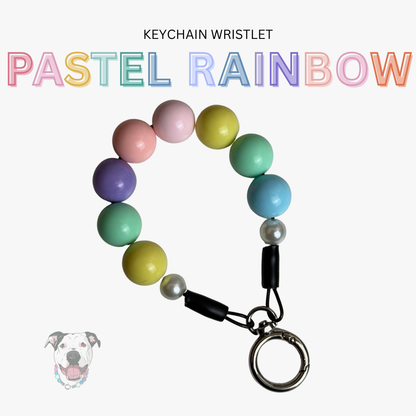 Pastel rainbow keychain wristlet on a white background with 'Pastel Rainbow' text above.