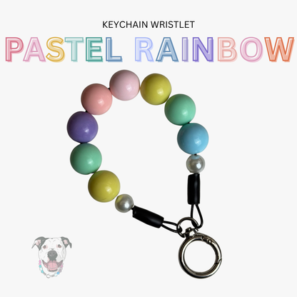Pastel rainbow keychain wristlet on a white background with text 'Keychain Wristlet Pastel Rainbow'.