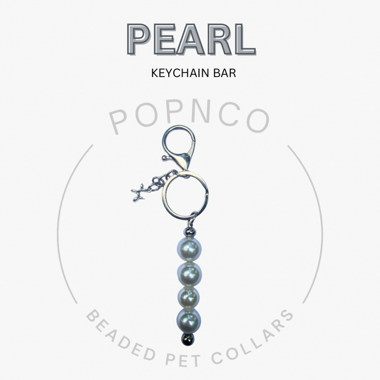Pearl keychain bar with Popnco branding on a white background
