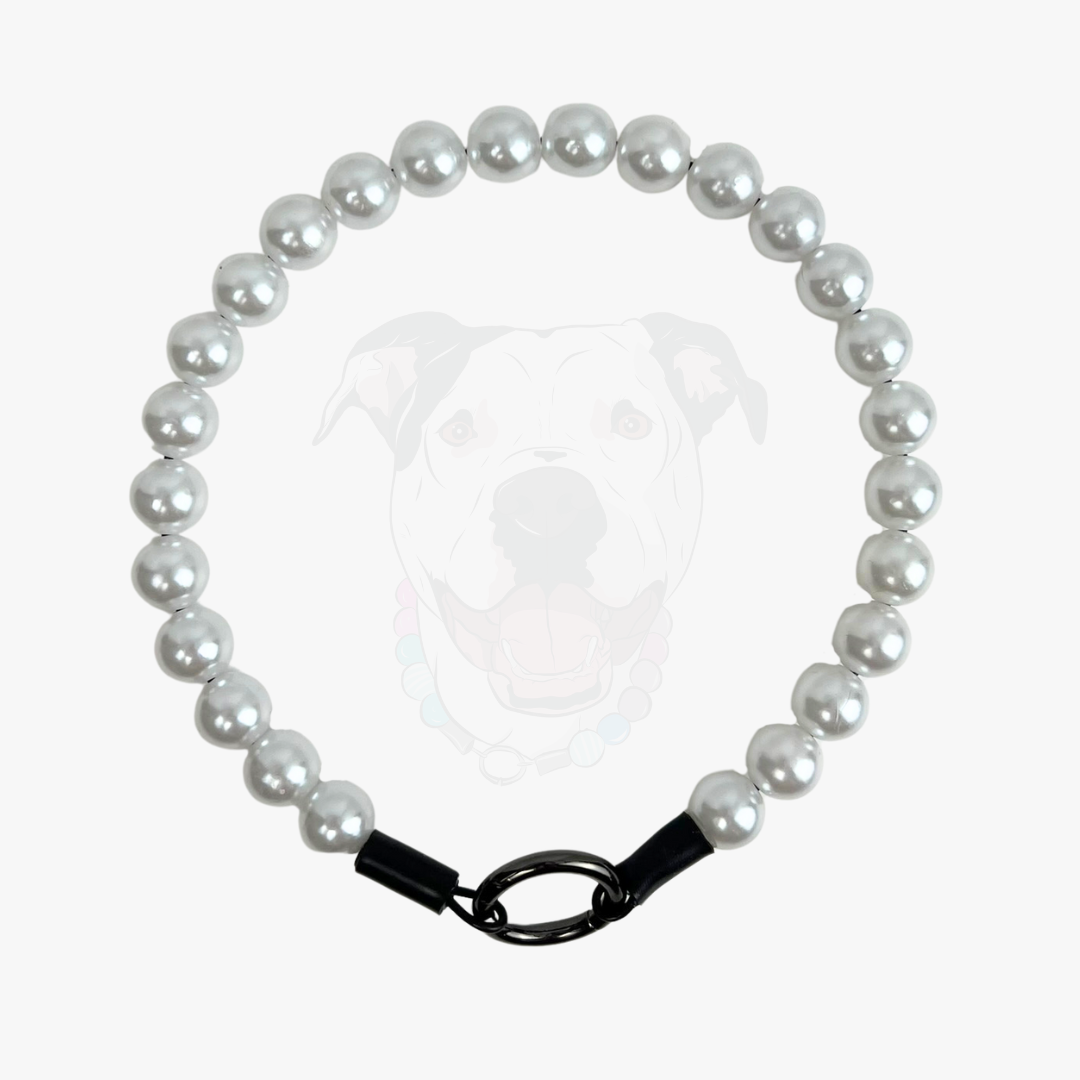 Pearl necklace with a black clasp on a white background