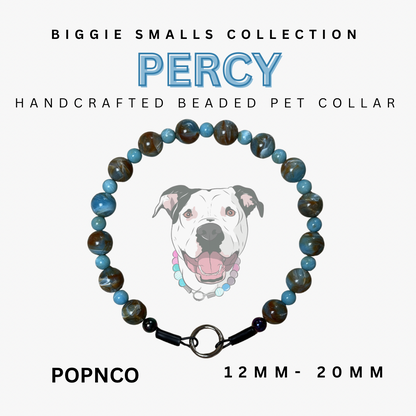 Handcrafted beaded pet collar with a dog illustration, labeled 'Percy' from the Biggie Smalls Collection.