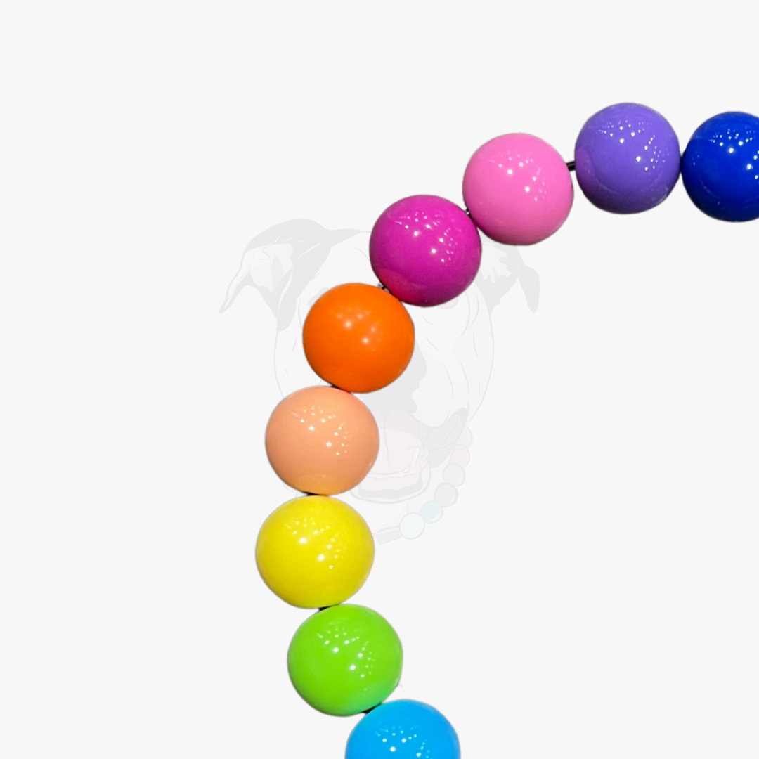 Colorful round beads on a white background