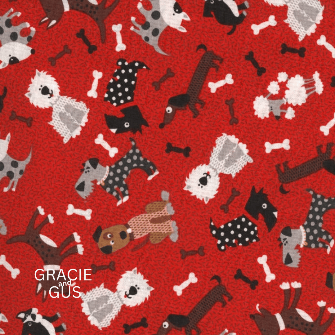 A repeating pattern on a bright red background featuring stylized dogs in black, white, gray, and tan, along with white bones. The text 'GRACIE and GUS' appears in the lower left corner.