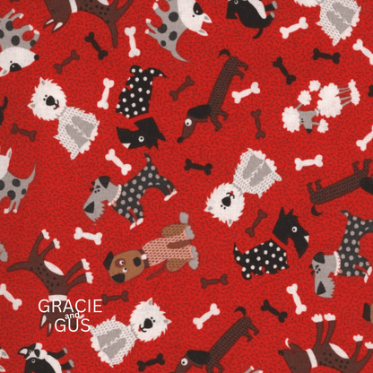 A repeating pattern on a bright red background featuring stylized dogs in black, white, gray, and tan, along with white bones. The text 'GRACIE and GUS' appears in the lower left corner.