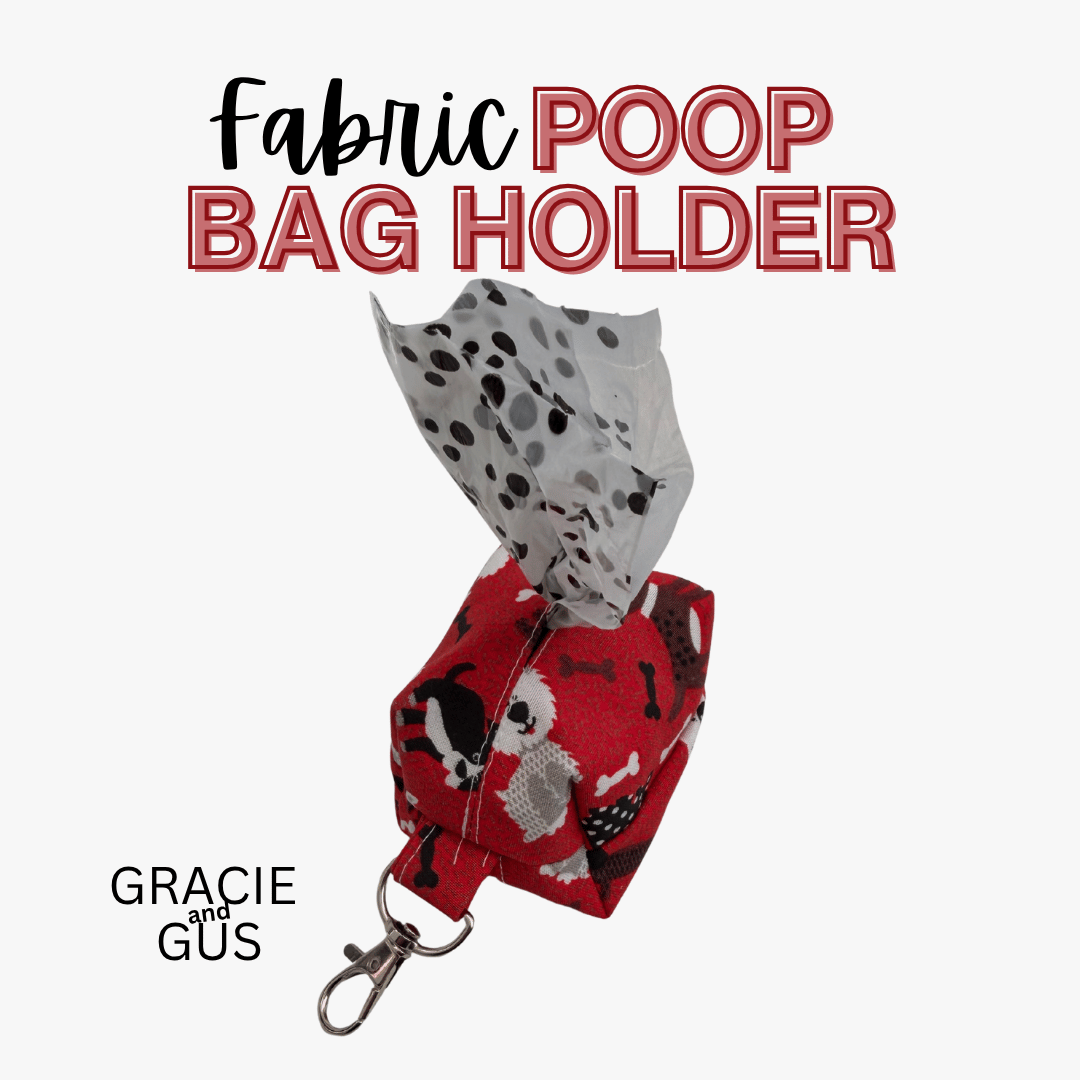 A fabric poop bag holder with a red, black, and white patterned pouch and a silver clasp, shown with tissue paper partially pulled out. Large text at the top reads 'Fabric POOP BAG HOLDER' and 'GRACIE and GUS' appears at the bottom left on a light gray background.
