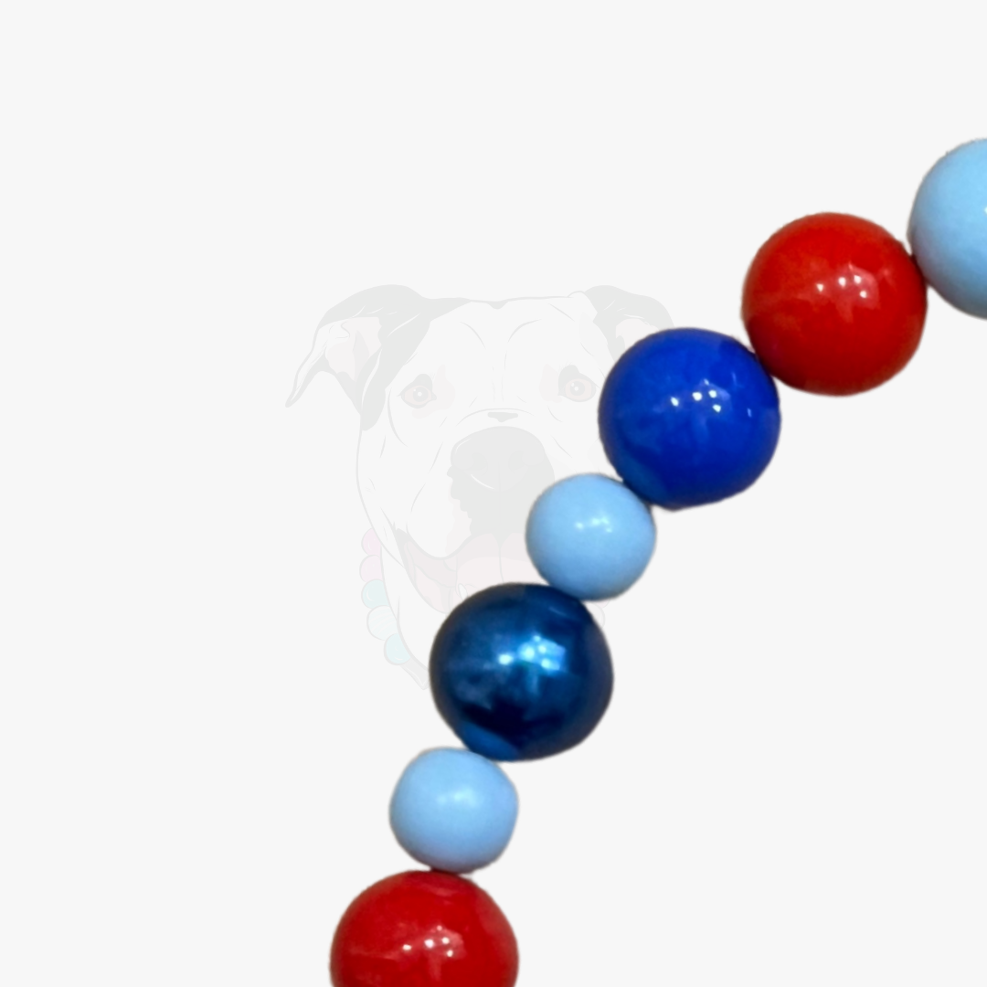 String of red, blue, and light blue balloons on a white background POPNCO