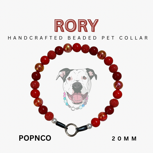 Handcrafted beaded pet collar with red and brown beads, black clasp, and 'Rory' branding on a white background.