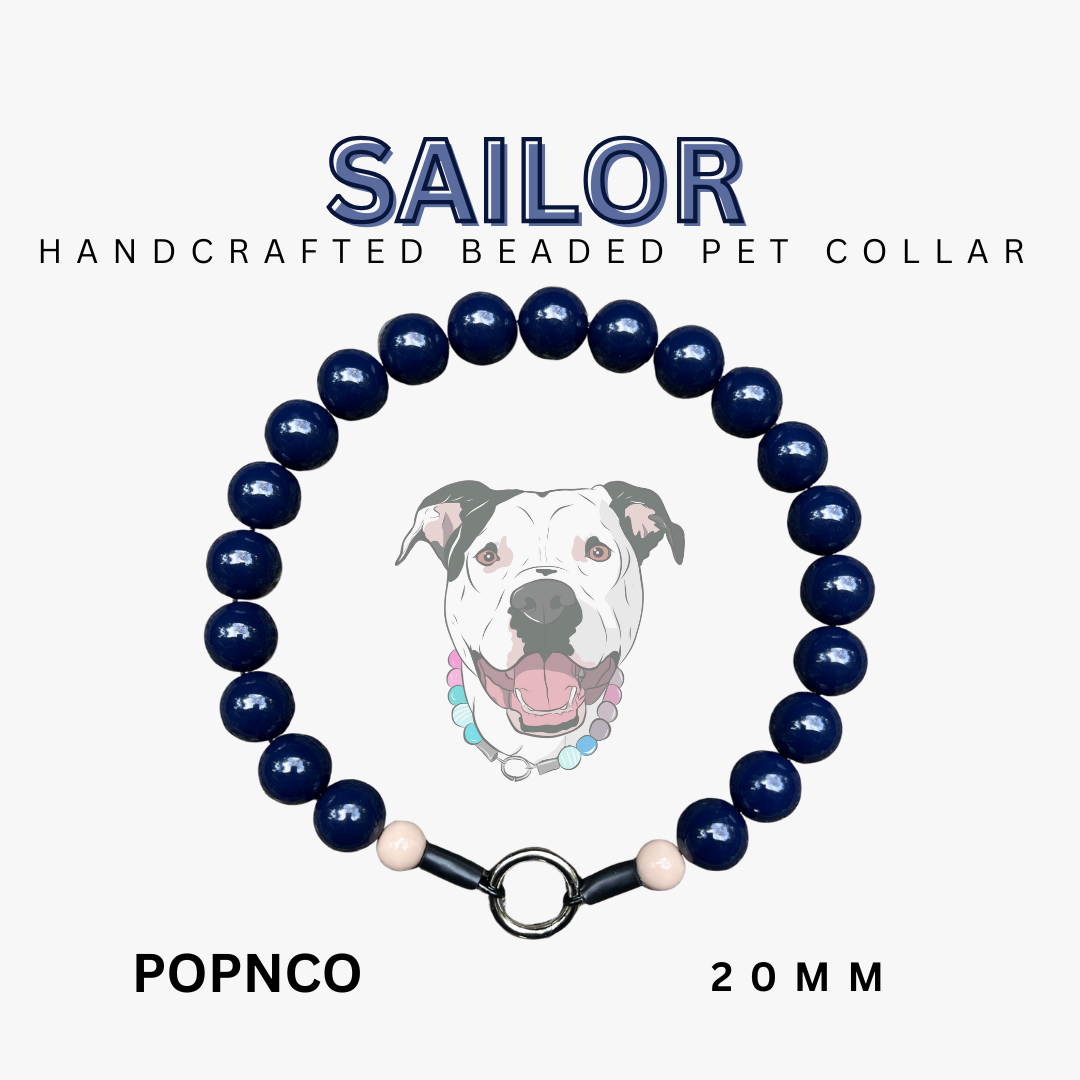 Handcrafted beaded pet collar with 'Sailor' branding on a white background