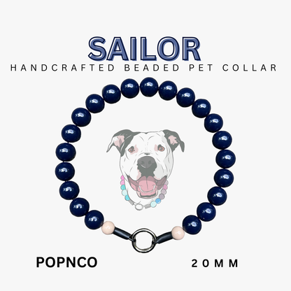 Handcrafted beaded pet collar with 'Sailor' branding on a white background