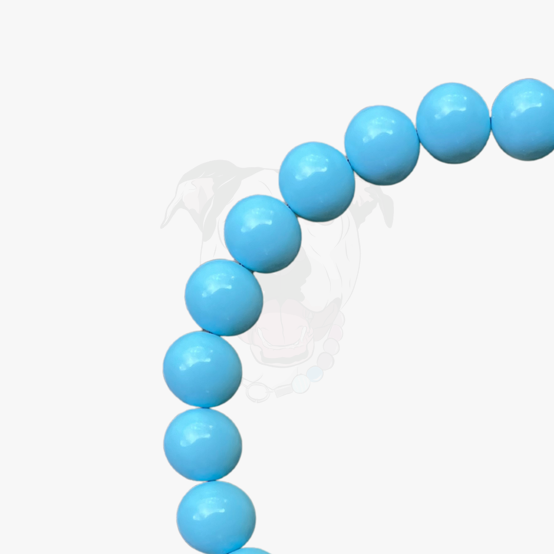 Blue beaded bracelet on a white background