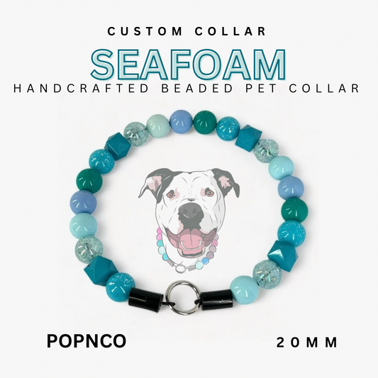 Seafoam green beaded pet collar with a dog illustration on a white background