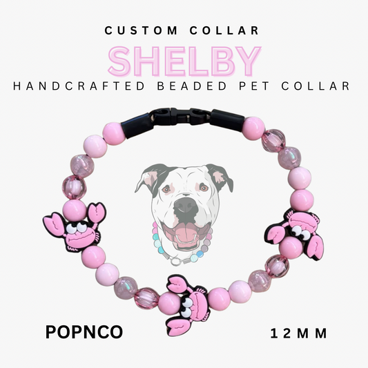 Handcrafted beaded pet collar with pink beads and cartoon dog charms on a white background.