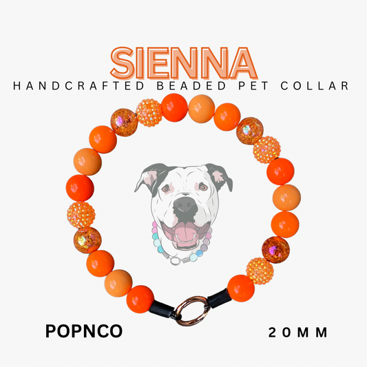 Handcrafted beaded pet collar with orange beads and a dog illustration on a white background.