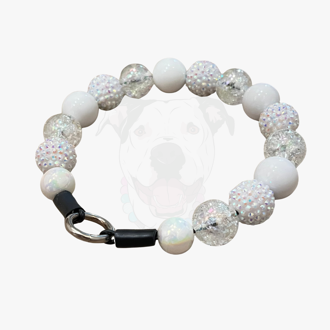 Bracelet with white and silver beads on a white background POPNCO