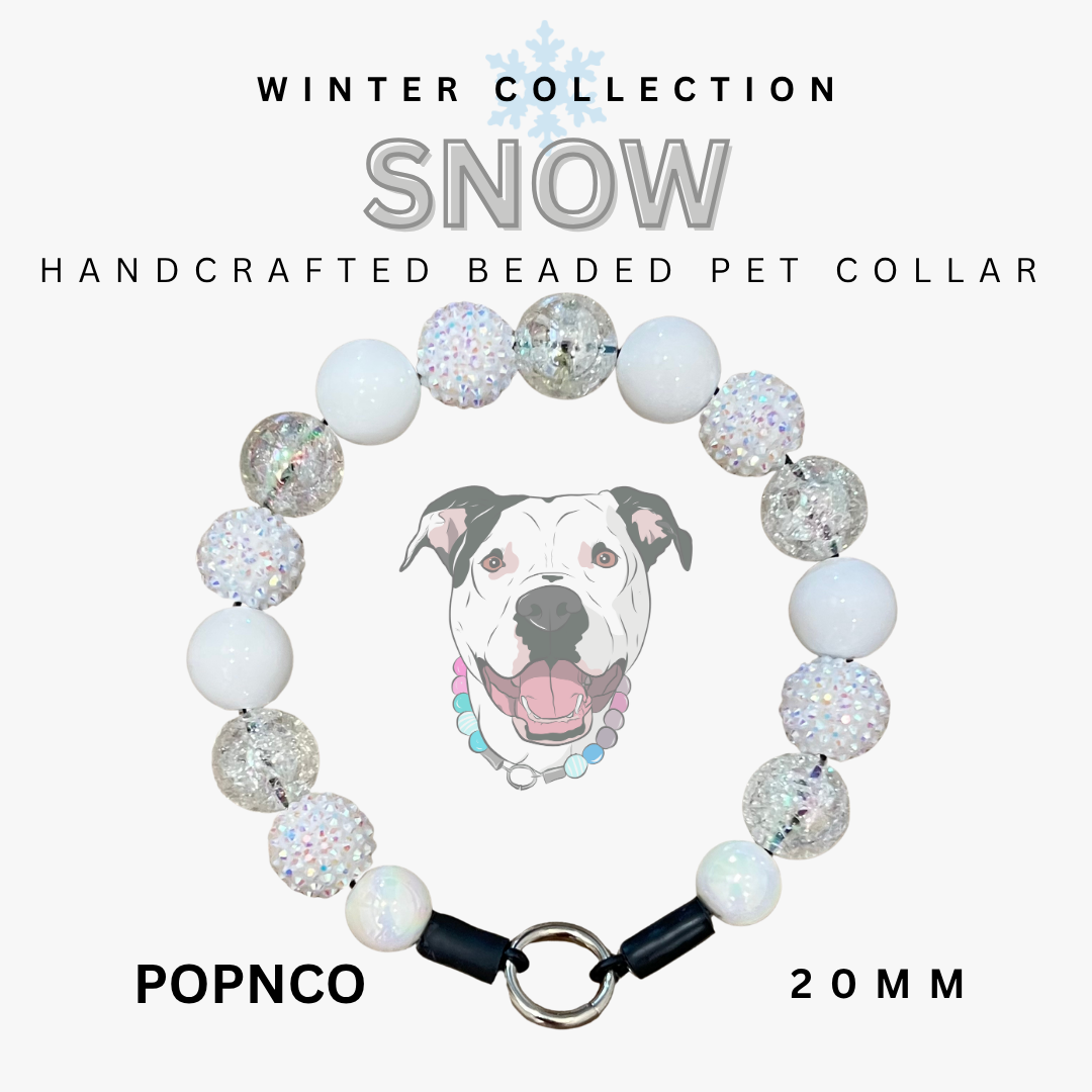 Handcrafted beaded pet collar with a dog illustration on a white background, labeled 'Snow' from the Winter Collection by POPNCO.