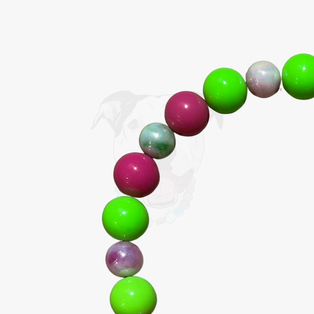 Colorful bubble gum balls arranged in an arch on a white background