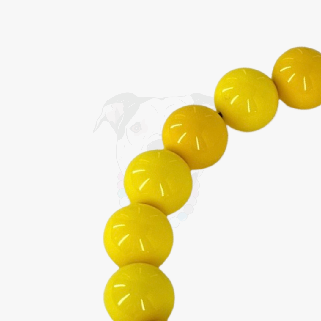 Yellow beaded bracelet on a white background POPNCO
