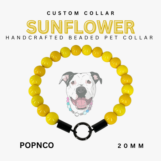 Handcrafted beaded pet collar with yellow beads and a black clasp, featuring a dog illustration on a white background.