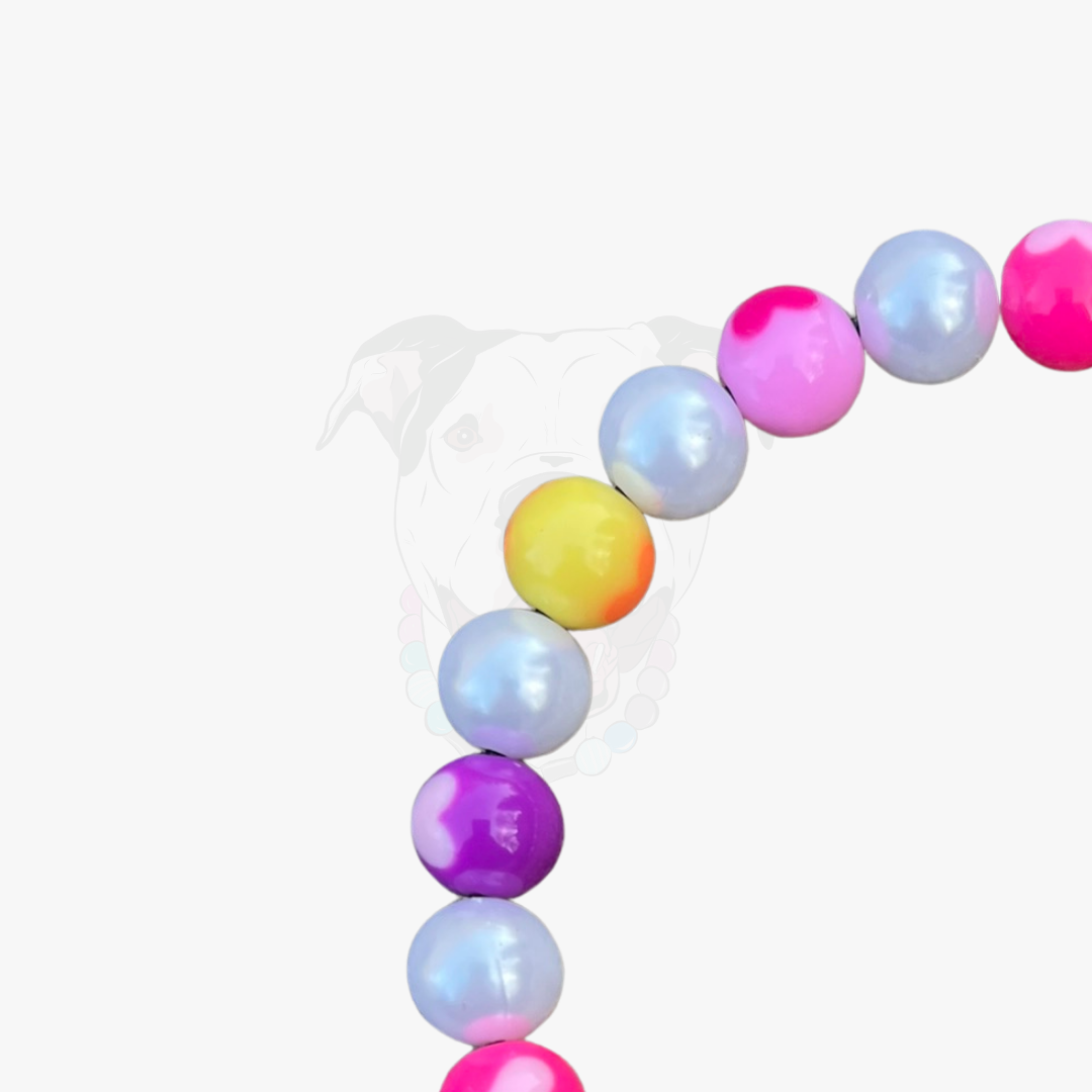 Colorful beaded bracelet on a white background POPNCO Acrylic Beads, beaded collar, Beaded dog collar, blue dog collar, Breathable dog collar, cat collar, Comfortable Dog Collar, dog collar, Durable dog collar, Easy to clean dog collar, Easy to clean dog collars, fashion collar, handmade, Pet accessories, pet collar, popnco, Popnco dog collar, slip on collar, Slip on dog collar, Stylish dog collar