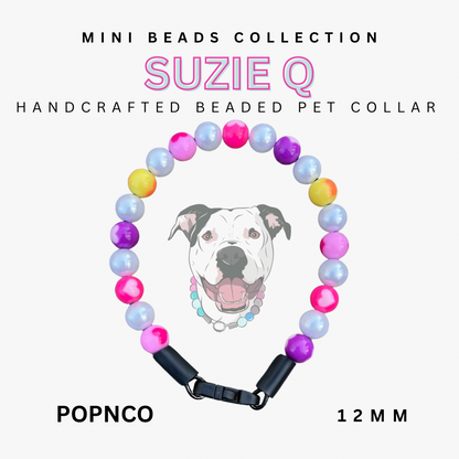 Handcrafted beaded pet collar with colorful beads and a dog's face on a white background, branded 'Suzie Q'.