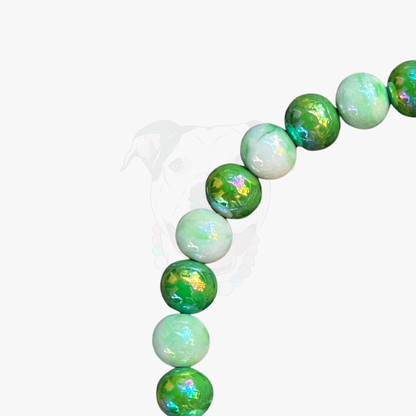 Green beaded bracelet on a white background