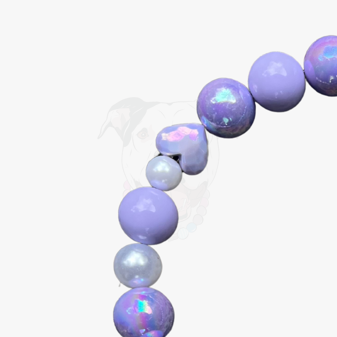 Necklace with purple and white beads on a white background