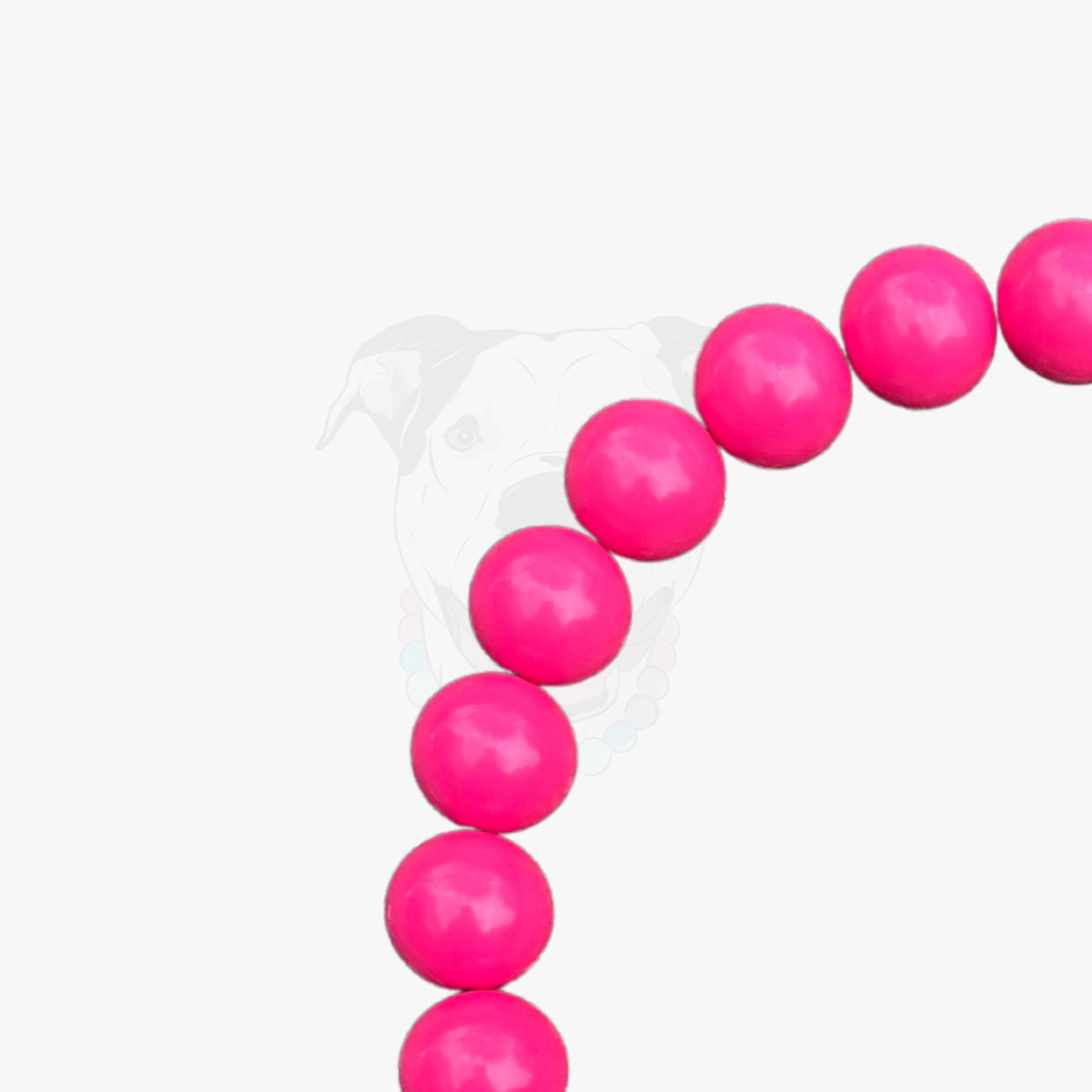 Pink beads on a white background