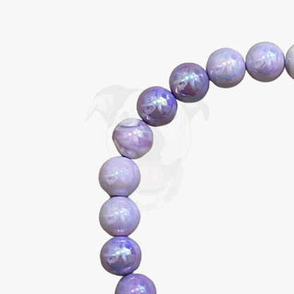 Purple beaded bracelet on a white background