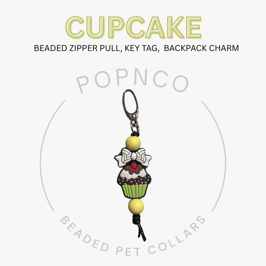 Cupcake-shaped beaded zipper pull, key tag, and backpack charm on a white background with 'Popnco' branding.