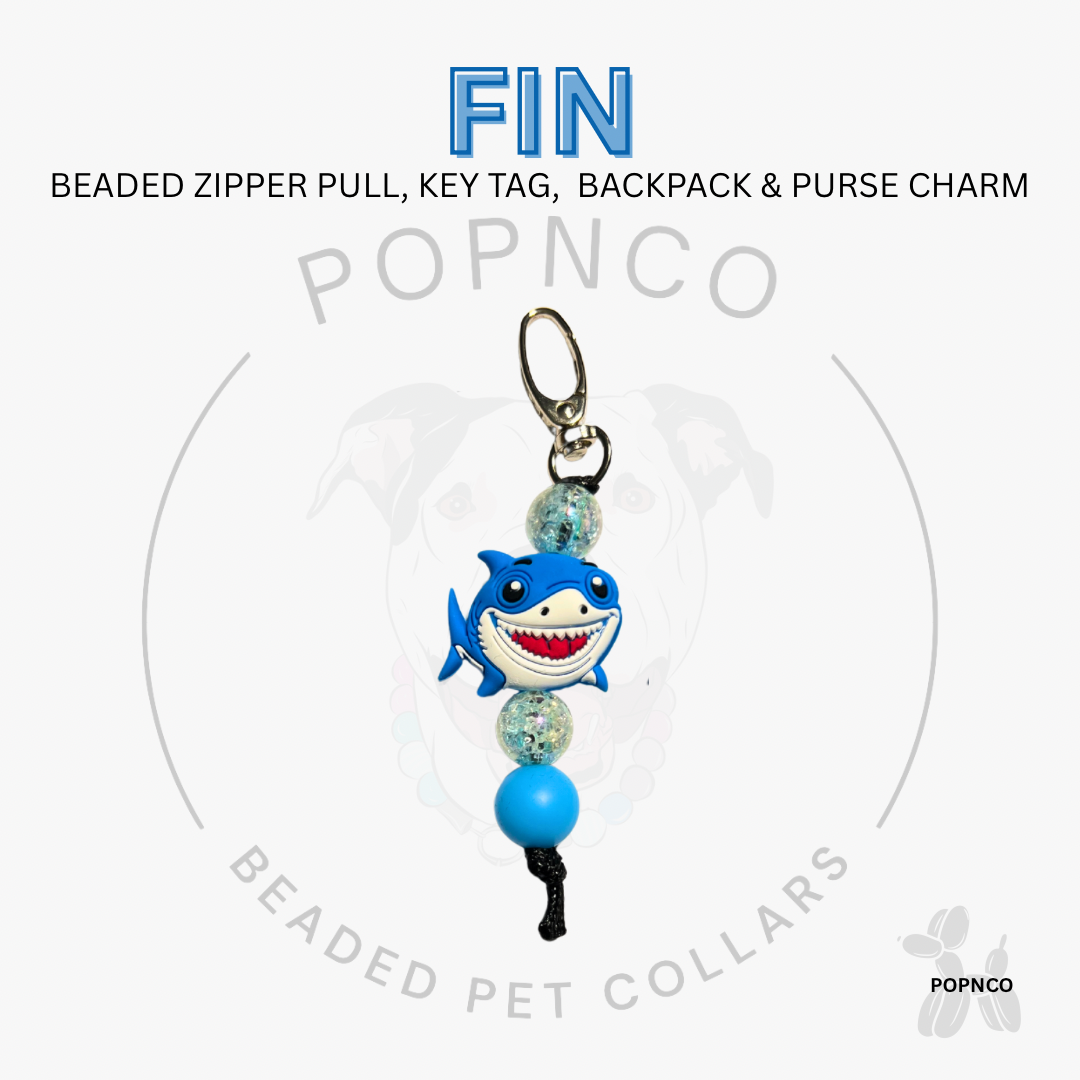 Shark-themed beaded zipper pull, key tag, backpack & purse charm with 'FIN' text on a white background.