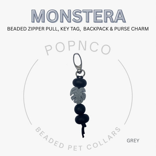 Beaded zipper pull, key tag, backpack & purse charm with 'MONSTERA' branding on a white background.