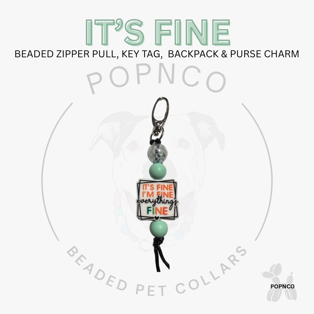 Beaded zipper pull, key tag, backpack & purse charm with 'It's Fine' message on a white background