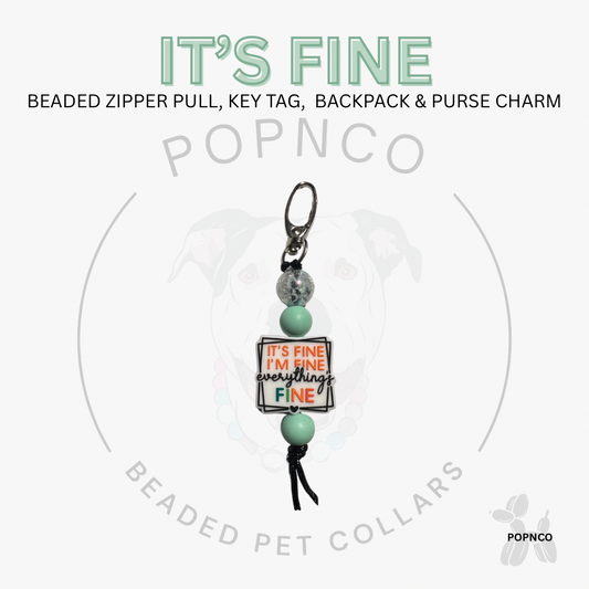 Beaded zipper pull, key tag, backpack & purse charm with 'It's Fine' message on a white background