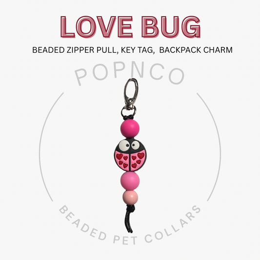 Love bug beaded zipper pull, key tag, backpack charm with POPNCO branding on a white background.