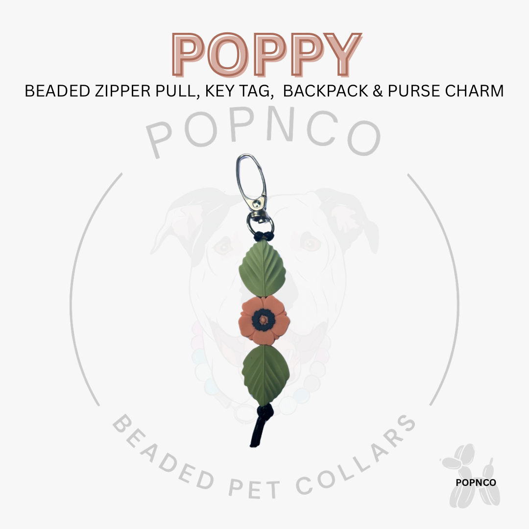 Beaded zipper pull, key tag, backpack & purse charm with 'Poppy' branding on a white background.