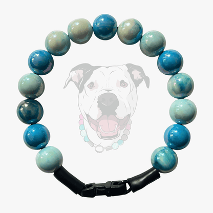 Close up of The Nelson beaded dog collar by POPNCO, featuring bright, iridescent AB acrylic beads that shimmer in the light, strung on heavy-duty cable.
