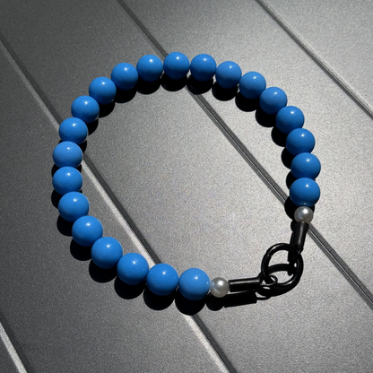 Close up detail of Juniper smooth lake blue acrylic beaded slip on dog collar by POPNCO handcrafted in BC Canada