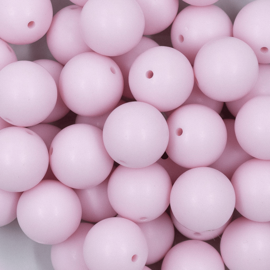 Close up of pale pink pastel beads used in the Pink Sugar collar by POPNCO