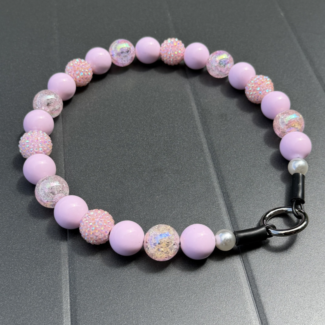 Close up of pale pink crackle and pastel bayberry beads used in the Pink Sugar collar by POPNCO