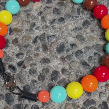 Video of POPNCO Stephen Beaded Pet Collar 20mm featuring Blue, yellow, orange, red and brown acrylic beads. 