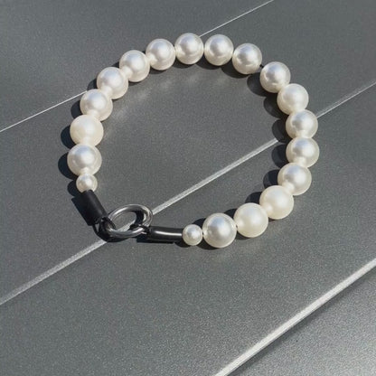 Video of Pearl beaded pet Collar from POPNCO on a Grey Table. 