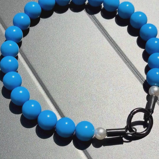 Video of dog wearing Juniper lake blue solid beaded collar by POPNCO handcrafted in BC