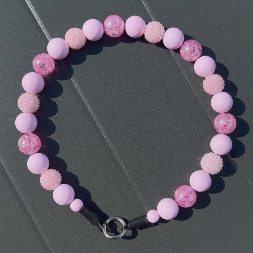 Close up of pale pink crackle and pastel bayberry beads used in the Pink Sugar collar by POPNCO