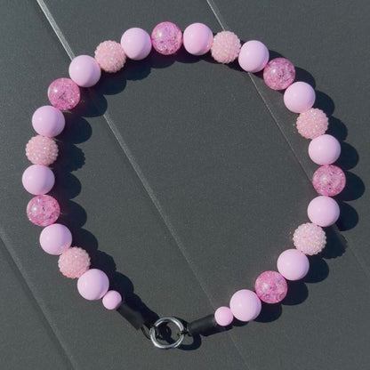 Close up of pale pink crackle and pastel bayberry beads used in the Pink Sugar collar by POPNCO