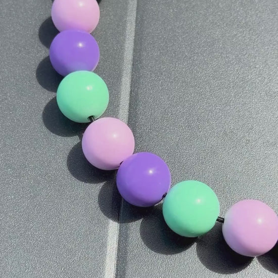 Stacey Beaded pet Collar Close up video showing off the detail in the pink, purple and green beads from POPNCO. 